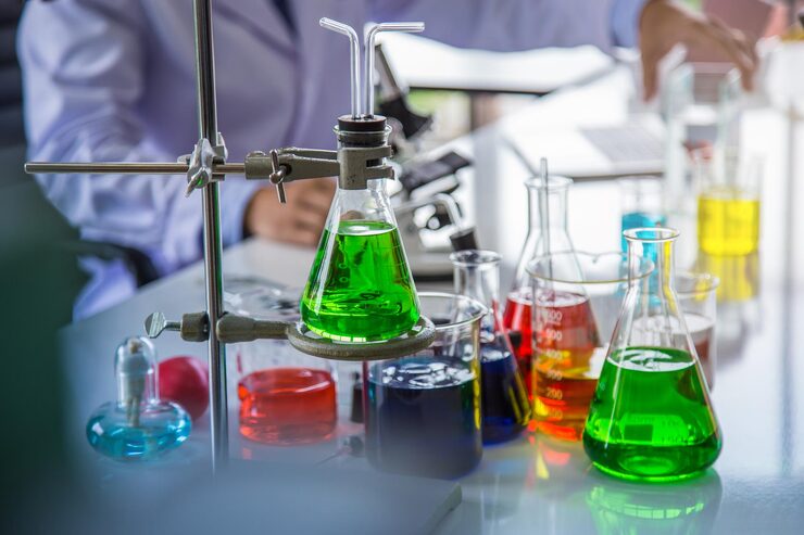 multi-colored-chemicals-flasks-table-laboratory_1048944-24904438